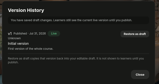 Version History dialog listing version v1 as Published and Live, with a Restore as draft button